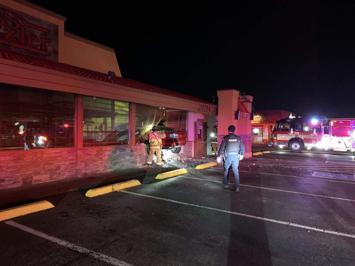 Lakewood police are investigating after a car crashed into the Sizzler restaurant in Lakewood early Monday morning.