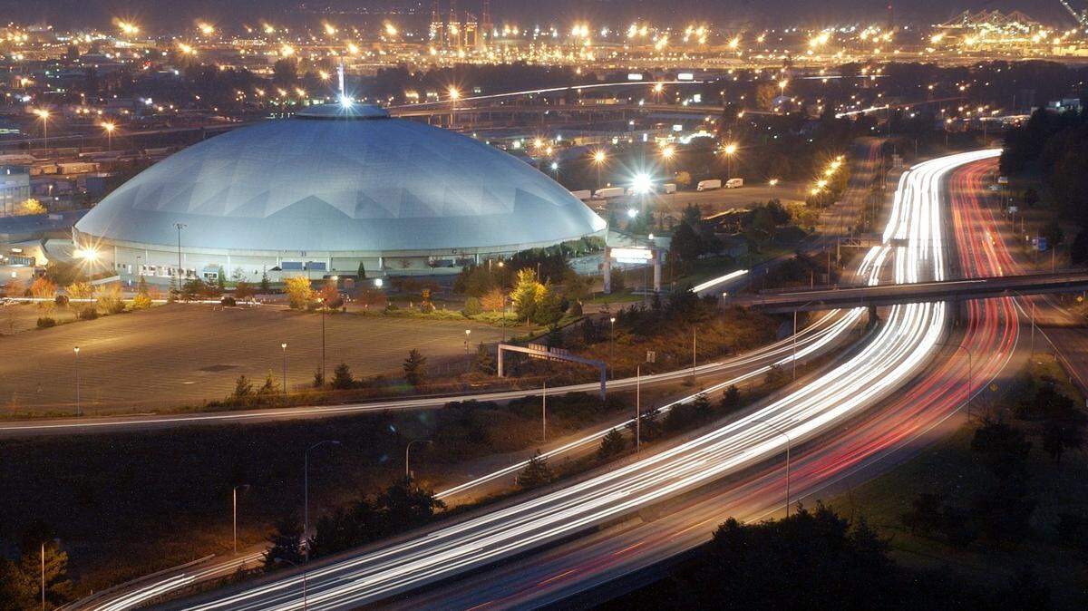 Tacoma Dome looking east from Pacific Tower. Interstate 5 traffic leaves streaks in this time exposure with the Port of Tacoma in the background. Photo made Thursday, October 27, 2005.