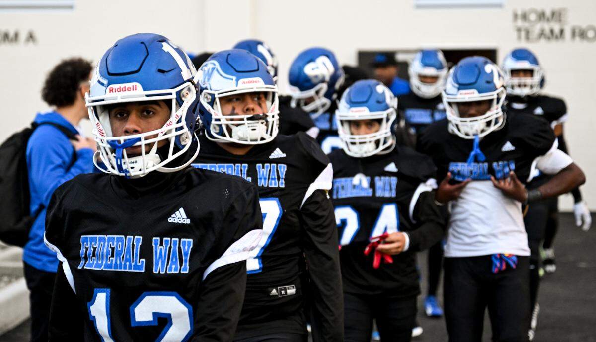 Federal Way Eagles take to the field the game against the Decatur Golden Gators at Federal Way Memorial Stadium, Thursday, Oct. 26, 2023, in Federal Way, Wash.