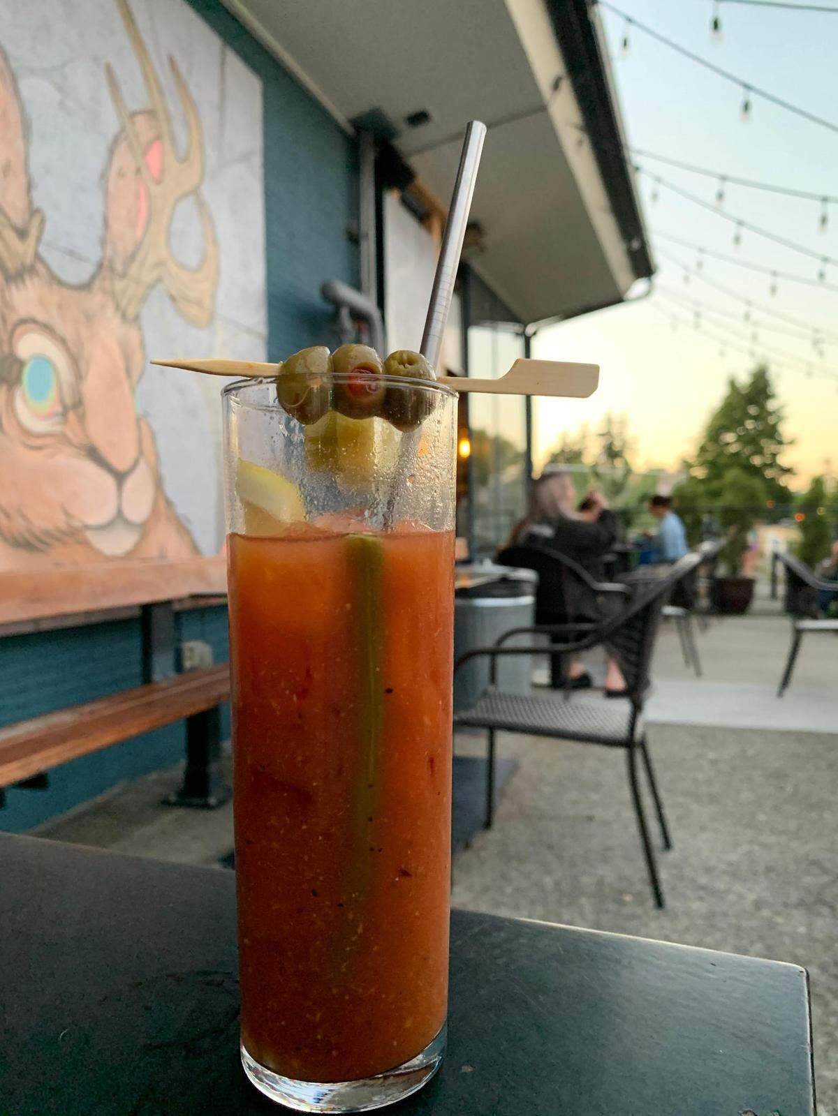 The jackelope mural at 1022 South J has become a neighborhood marker. It will stick around, said Morgan, but will be updated by the artist. Perhaps this offbeat Red Snapper, a bloody mary of sorts with gin, will, too.