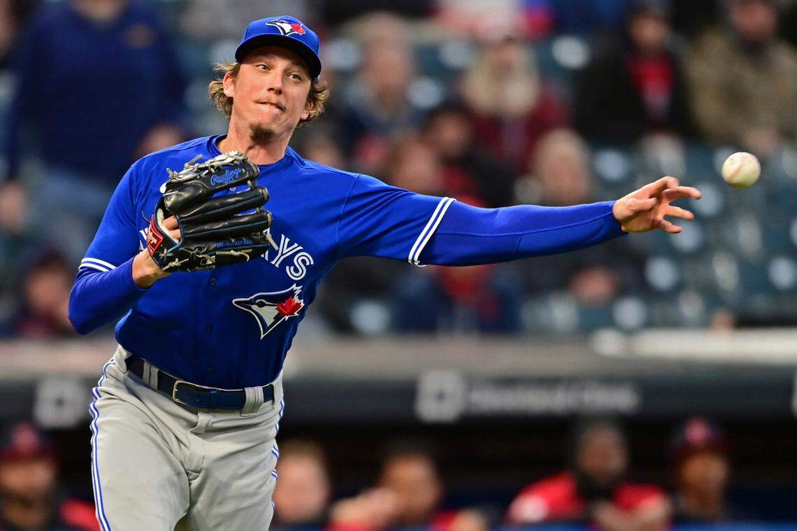 Toronto Blue Jays relief pitcher Ryan Borucki throws to first for the out on Cleveland Guardians’ Ernie Clement during the sixth inning in the second baseball game of a doubleheader Saturday, May 7, 2022, in Cleveland. The Guardians won 8-2. (AP Photo/David Dermer)