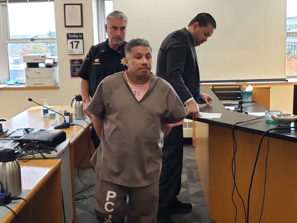 Jerry Espana Davila leaves a Pierce County Superior Court room on Friday, Oct. 17, 2025, after being sentenced to nearly 33 years in prison for the 2024 murder of Virgil “Ray” Stebbins in Tacoma.