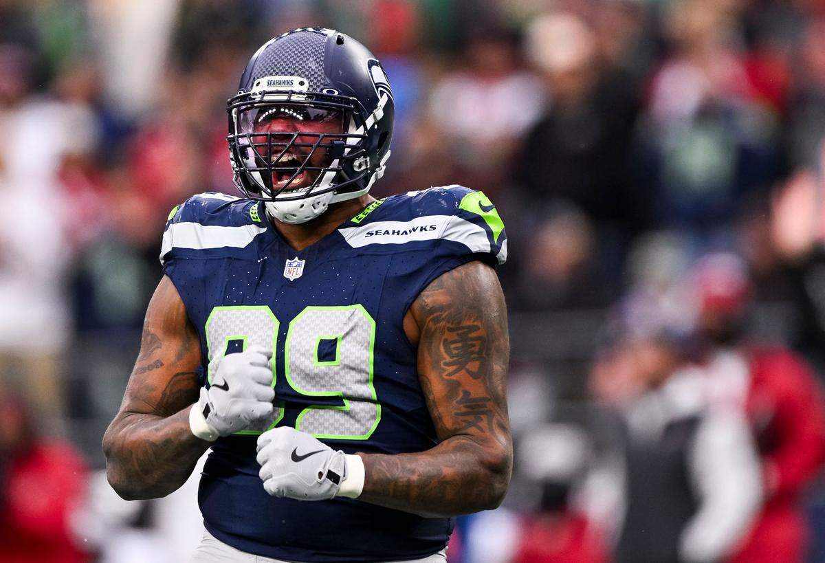 Seattle Seahawks defensive end Leonard Williams (99) reacts to a stop against the Arizona Cardinals during the third quarter of the game at Lumen Field, on Sunday, Nov. 24, 2024, in Seattle, Wash.