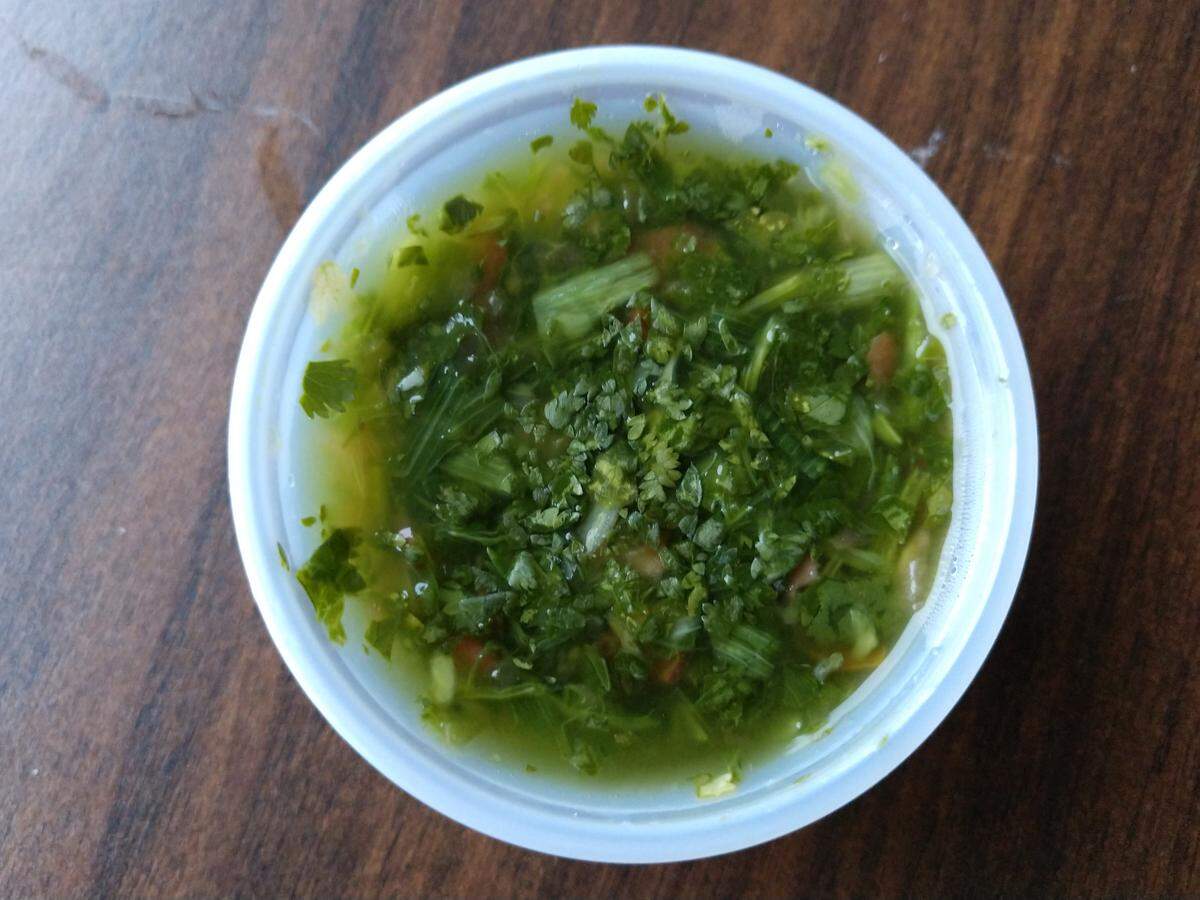 Aji sauce is made with cilantro at Sabor Colombiano Luis Panes Empanadas in Tacoma.