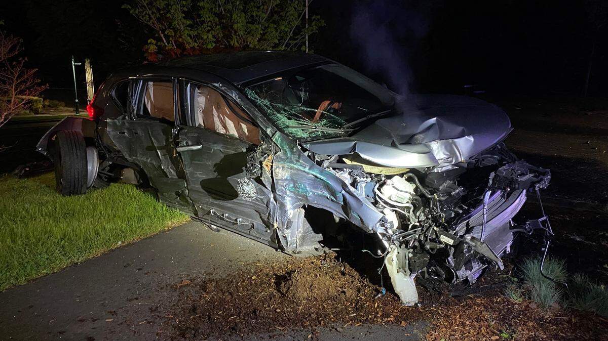 A woman faces charges after she lost control of her car and crashed into a Gig Harbor restroom building on Tuesday.