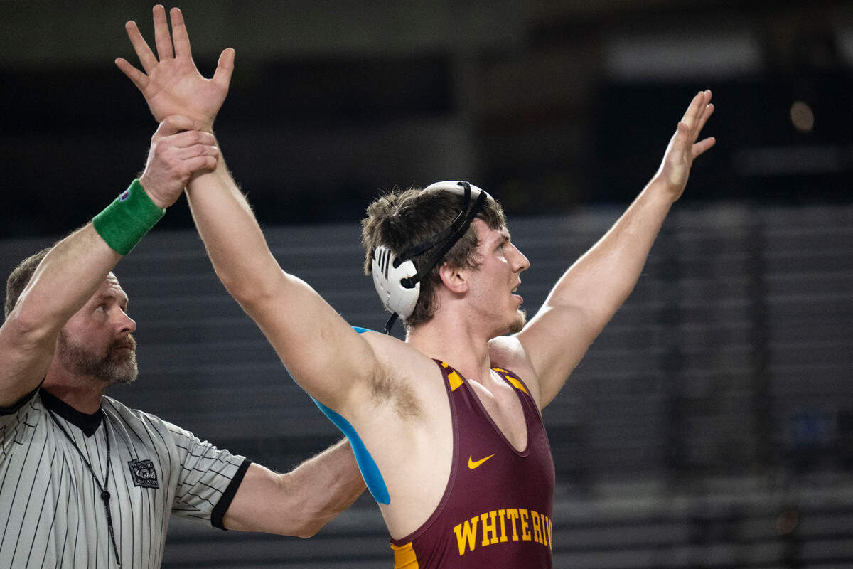 White River’s Riley Simmons celebrates after beating Decatur’s Nehemiah Washington in the Class 3A, 215-pound title match on Friday, Feb. 21, 2025, at Mat Classic XXXVI at the Tacoma Dome in Tacoma, Wash.