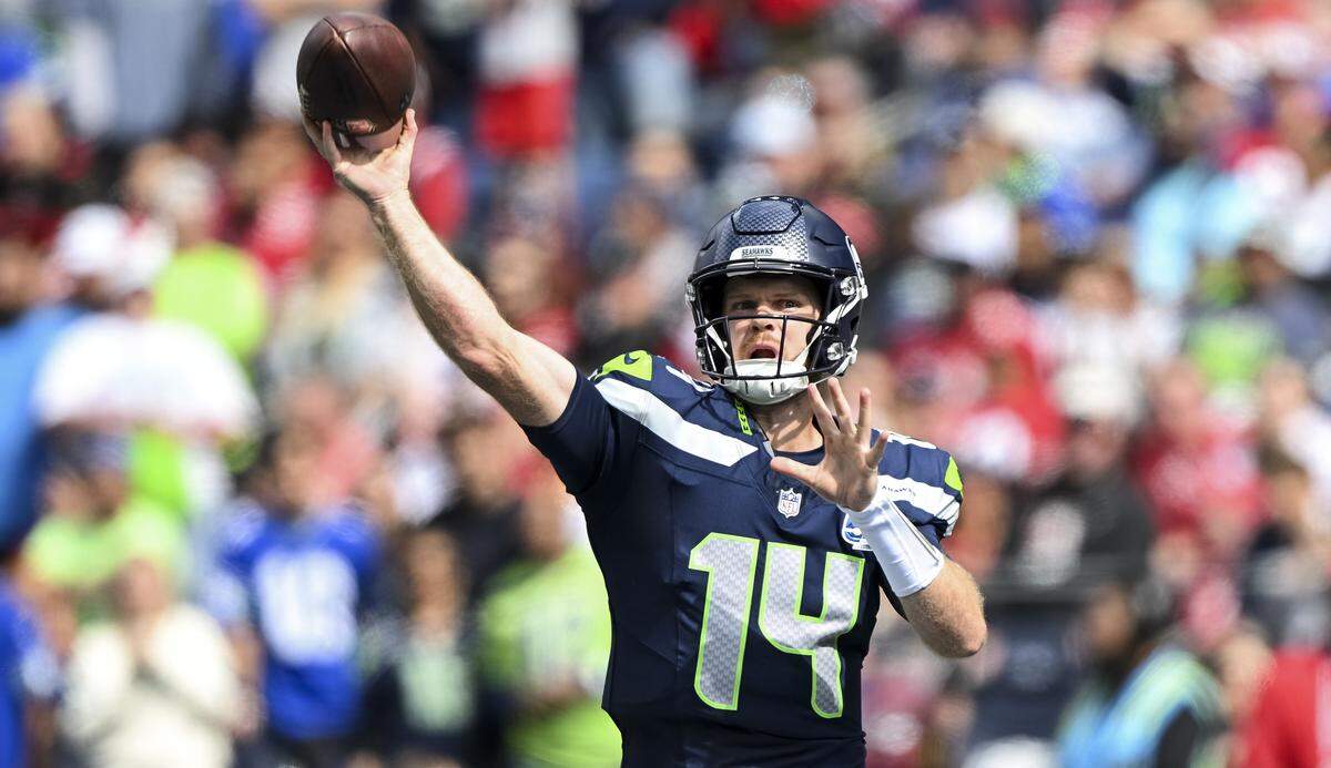 Seattle Seahawks quarterback Sam Darnold (14) throws during the first quarter of the game against the San Francisco 49ers at Lumen Field, on Sunday, Sept. 7, 2025, in Seattle.