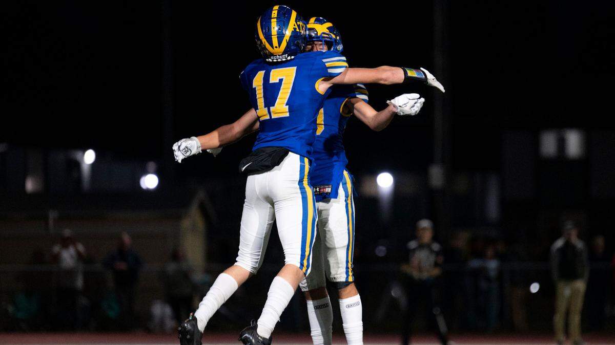 Fife defensive back Tylor Kern celebrates with Beau Faulaau after intercepting a pass by Enumclaw quarterback Gunnar Trachte intended for Austin Paulson during the second quarter of 2A SPSL game on Thursday, Sept. 22, 2022, at Fife High School in Fife, Wash.
