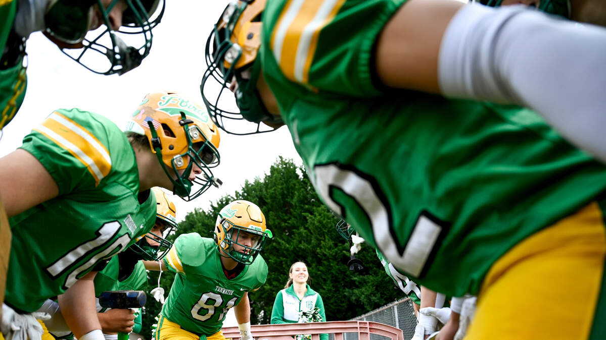 Tumwater Thunderbirds huddle before running on the field before the first half of the 2A state quarterfinals against the Clarkston Bantams at Tumwater District Stadium, Saturday, Nov. 18, 2023, in Tumwater, Wash.