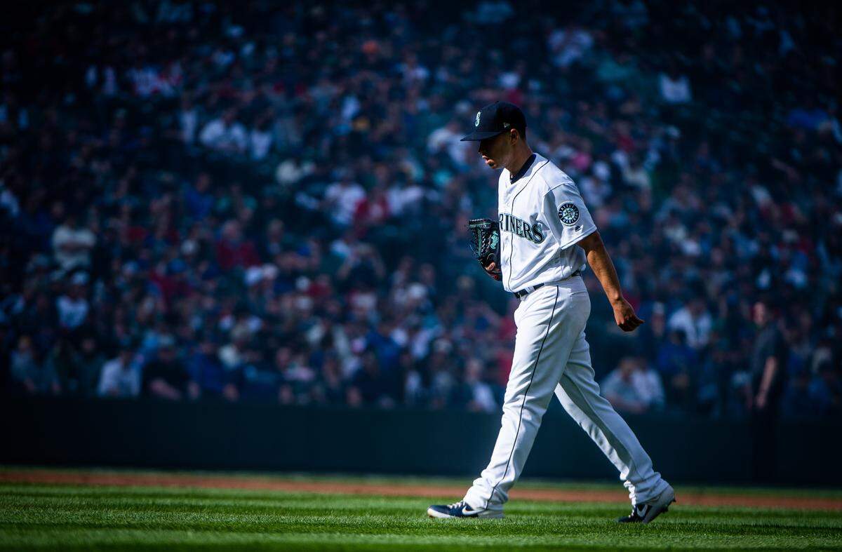 Pitcher Marco Gonzales walks to the mound before the first pitch. The Seattle Mariners played the Boston Red Sox in a Major League Baseball game at T-Mobile Park in Seattle, Wash., on Thursday, March 28, 2019. 