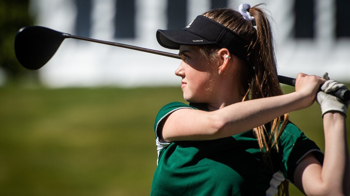 Makena Mehlert tees off at a driving range during practice at Canterwood Golf Club in Gig Harbor, Wash., on Monday, April 29, 2019.