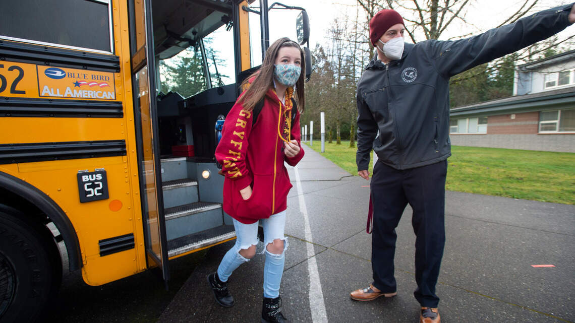 Should kids be inoculated against COVID to attend Washington schools? It’s being studied