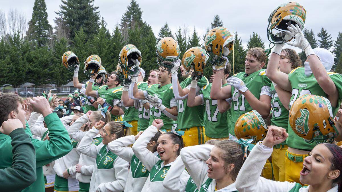 Tumwater fans, cheerleaders and players cheer along to a school fight song after their win over Franklin Pierce on Saturday, Nov. 22, 2025, in Tumwater, Wash.