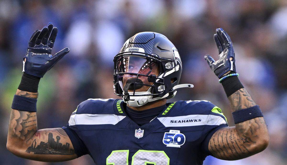 Seattle Seahawks tight end Elijah Arroyo (18) reacts to a reception during the first quarter of the game against the Las Vegas Raiders at Lumen Field, on Thursday, Aug. 7, 2025, in Seattle, Wash.