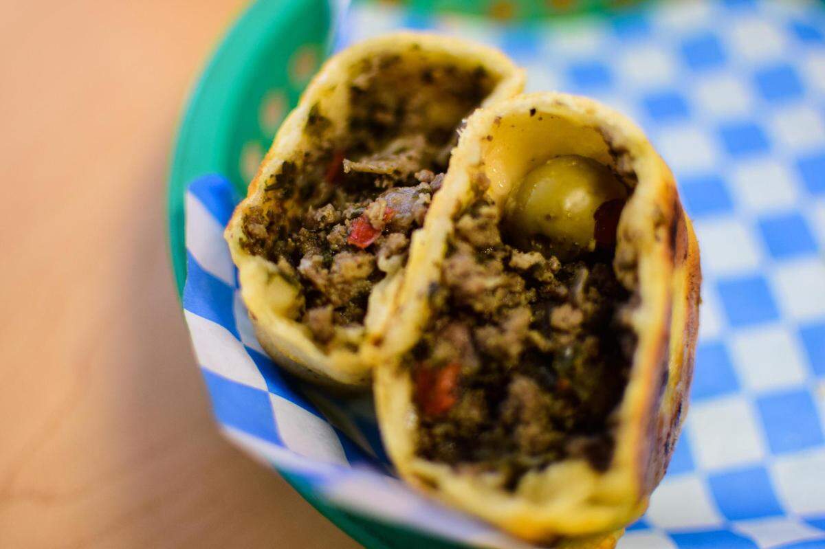 Sur Bakery serves Argentinian pastries and sandwiches at 10518 South Tacoma Way in Lakewood, Wash. Sit down at the new cafe side of the business to enjoy fresh empanadas filled with beef, onion, pimento olives, red pepper and spices, or classic ham and cheese.