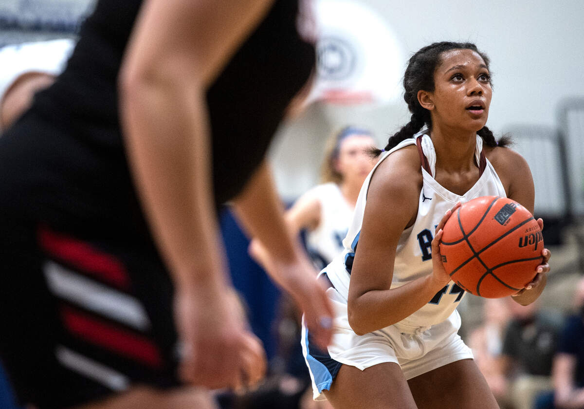 Olympia forward Natalia McBride (44) prepares to shoot from the foul line during a West Central III/Southwest bi-district tournament girls basketball opening-round game on Friday, Feb. 11, 2022, at Olympia High School in Olympia, Wash.