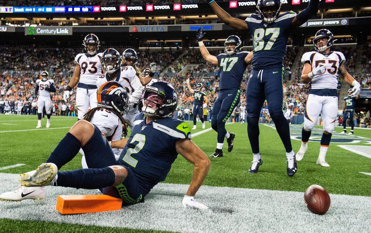 Seattle Seahawks quarterback Paxton Lynch (2) celebrates after a scrambling touchdown during the fourth quarter. The Seattle Seahawks played the Denver Broncos in a NFL preseason game at CenturyLink Field in Seattle, Wash., on Thursday, Aug. 8, 2019.
