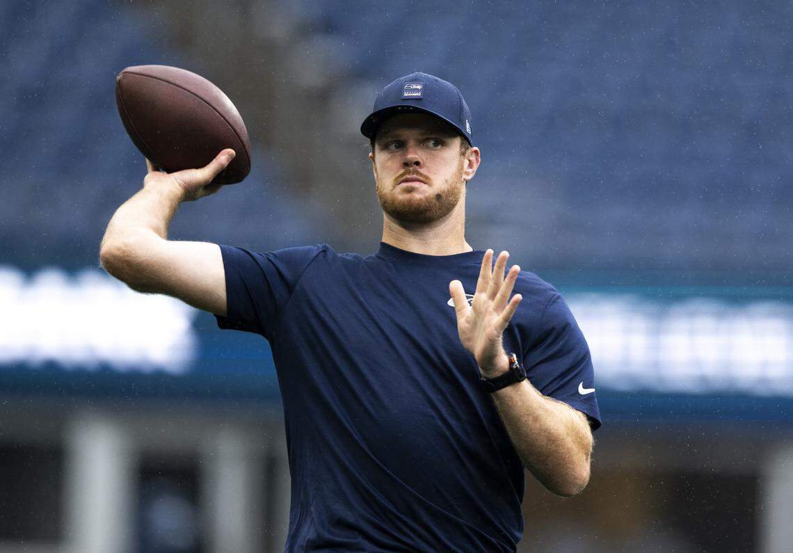 Seattle Seahawks quarterback Sam Darnold (14) warms up before the game against the New Orleans Saints at Lumen Field, on Sunday, Sept. 21, 2025 in Seattle.