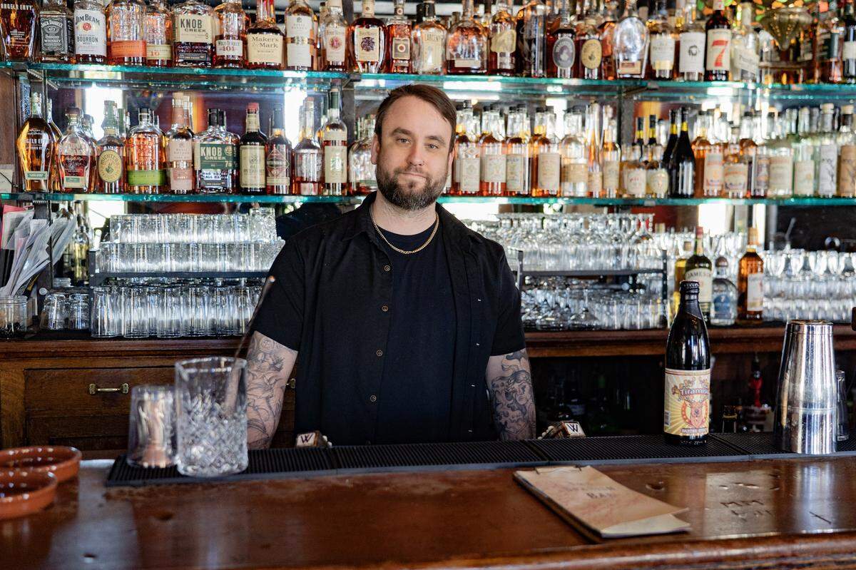 Ian Slick, general manager of McMenamins Elks Temple, poses for a portrait at the Spanish Bar on April 9 in Tacoma.