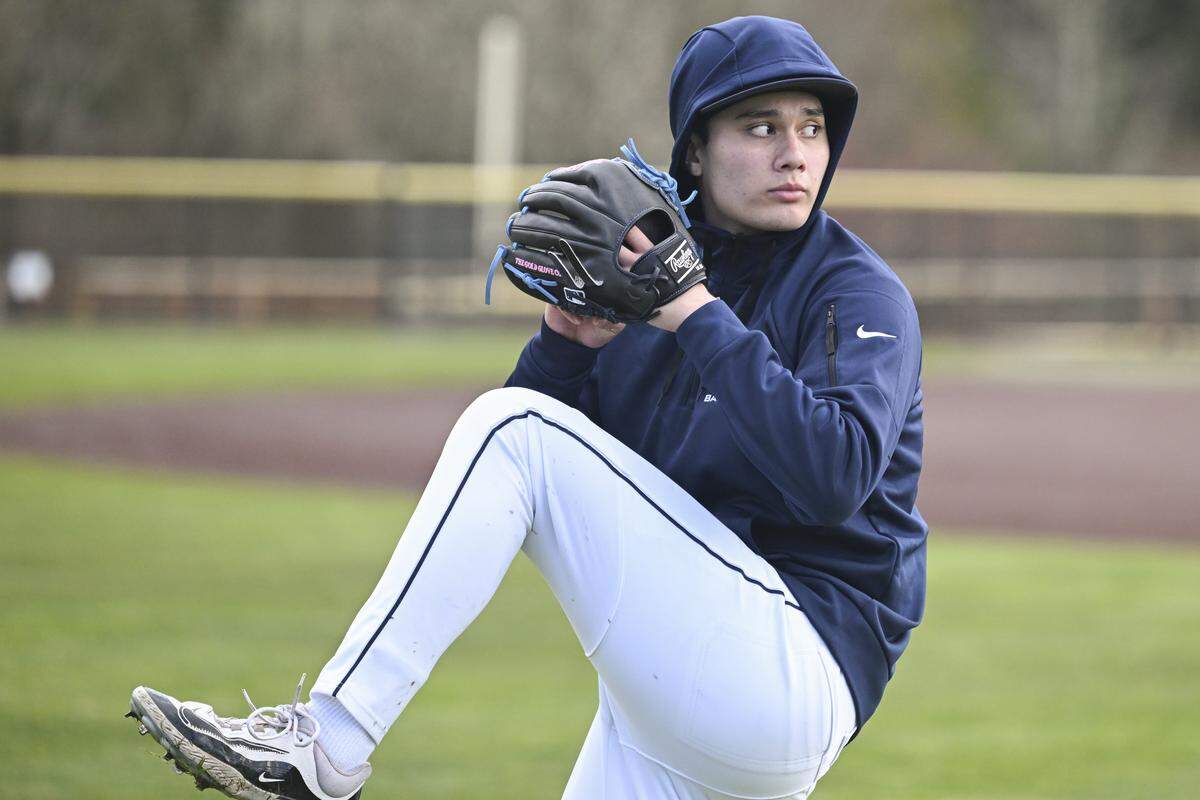 Gig Harbor pitcher Quentin Bockhorn prepares a throw during warm ups on Monday, March 9, 2026, at a practice in Gig Harbor.