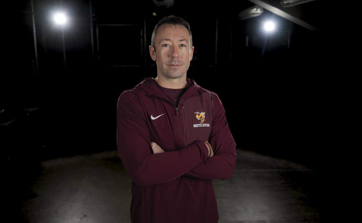 White River head coach Wyatt Evenson poses for a portrait after being selected as first-team offense coordinator for The News Tribune’s 2025 All-Area football team at Mount Tahoma High School, on Sunday, Dec. 7, 2025, in Tacoma, Wash.
