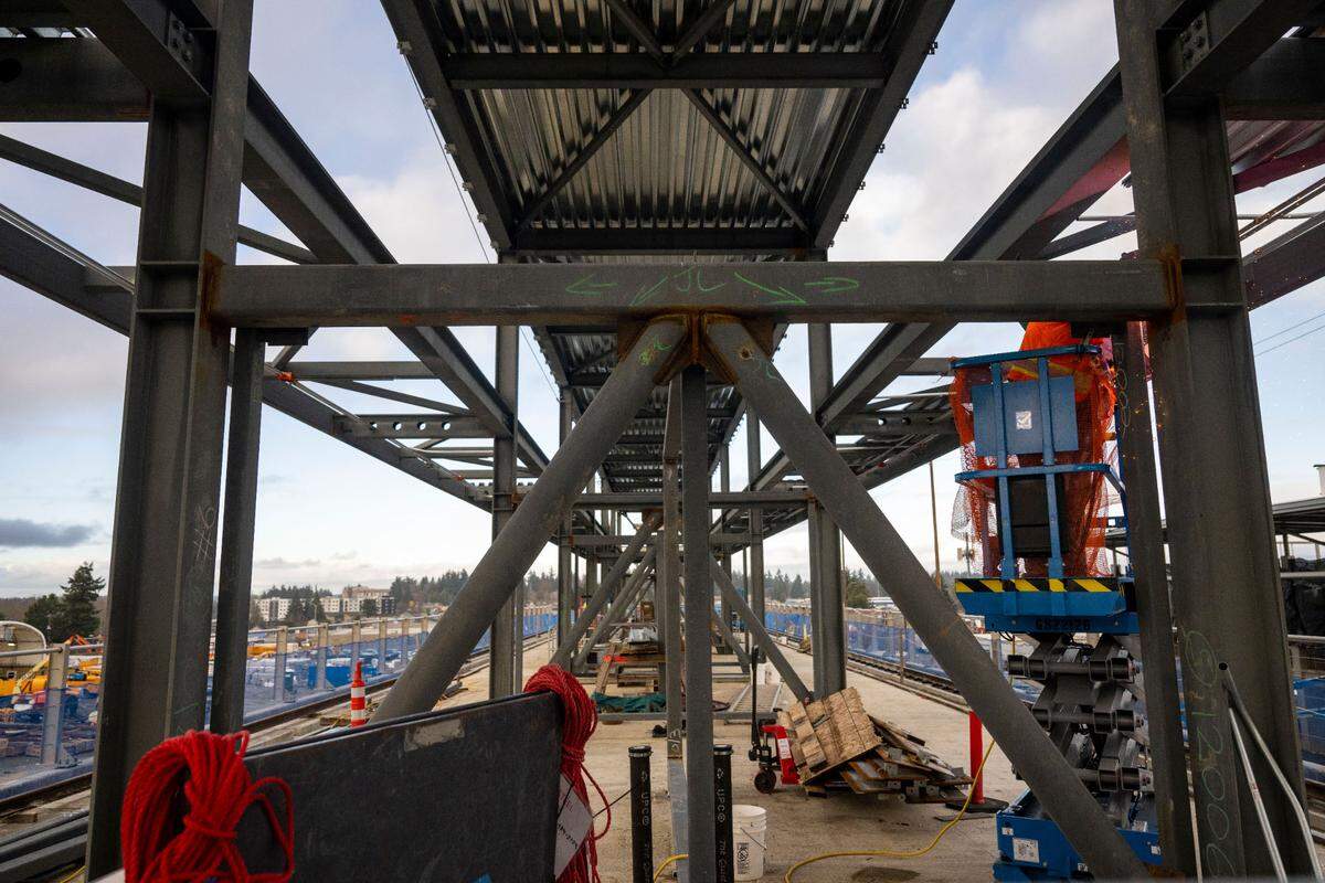 Contractors for Sound Transit work on the new Kent/Des Moines station on the Federal Way Link extension project on Wednesday, Dec. 28, 2022 in Des Moines, Wash. It’s one of three new stations on the 7.8-mile route.