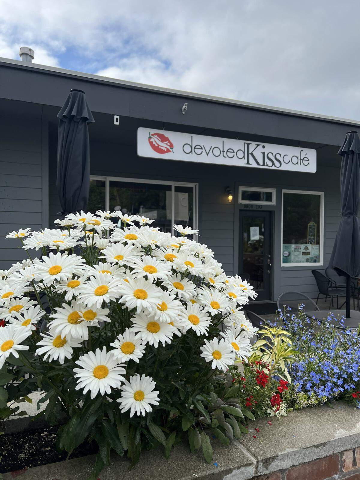 The entrance to Devoted Kiss Café at 8809 N. Harborview Dr. Suite 203, in Gig Harbor, Wash.