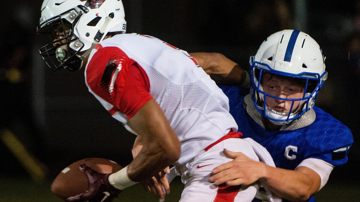 Steilacoom’s Emeka Egbuka (2) is tackled by Eatonville’s Jackson Roulst as he returns an interception in the second quarter. Egbuka scored three touchdowns in the first half. Eatonville played Steilacoom at Eatonville High School in Eatonville, Wash., on Friday, Oct. 12, 2018.