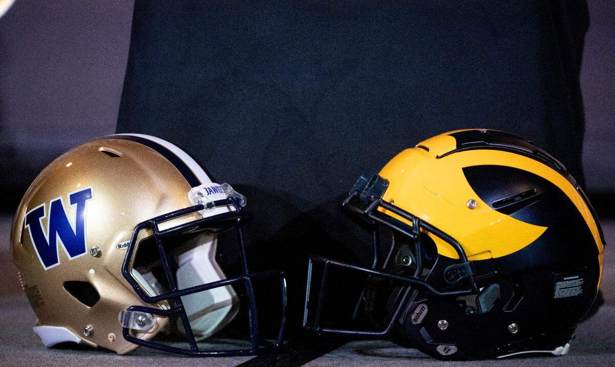 Washington head coach Kalen DeBoer and Michigan head coach Jim Harbaughanswer questions from the media ahead of the College Football Playoff National Championship game, on Sunday, Jan. 7, 2024, in Houston.