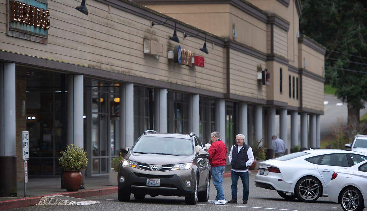 Peninsula Shopping Center in Gig Harbor, Wash., on Thursday, March 17, 2022. Plans to attract a regional grocery store to the site have fallen through in recent years. Rush Development bought partial stake in the Peninsula Shopping Center on Feb. 25, 2020.