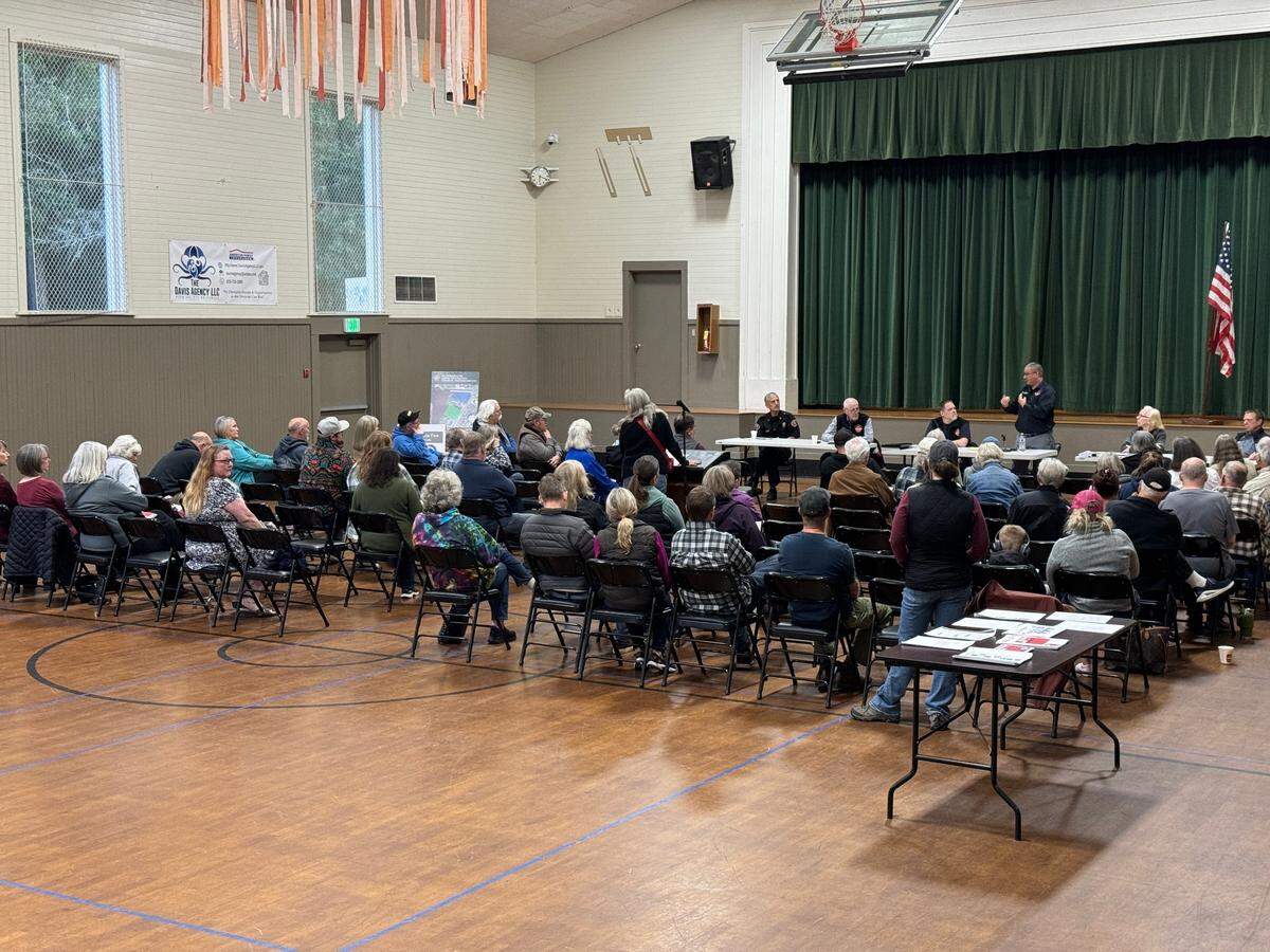 The Key Peninsula Fire Department commissioners and chief hosted a town hall Oct. 10, 2024. at the Key Peninsula Civic Center to field questions and discuss the future of their 2021 property purchases in Key Center.