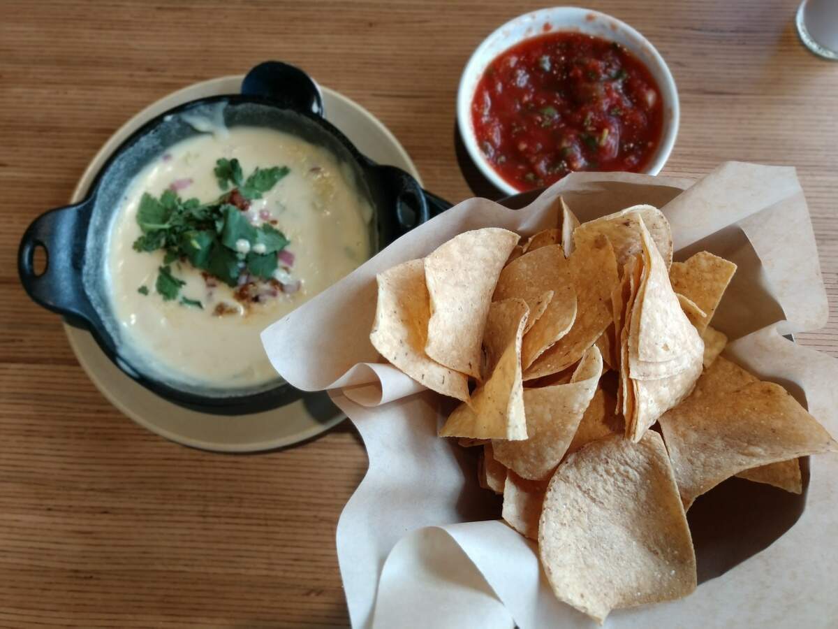 Chips, salsa and queso dip with chorizo from Cactus Southwestern Kitchen + Bar in Tacoma’s Proctor neighborhood.