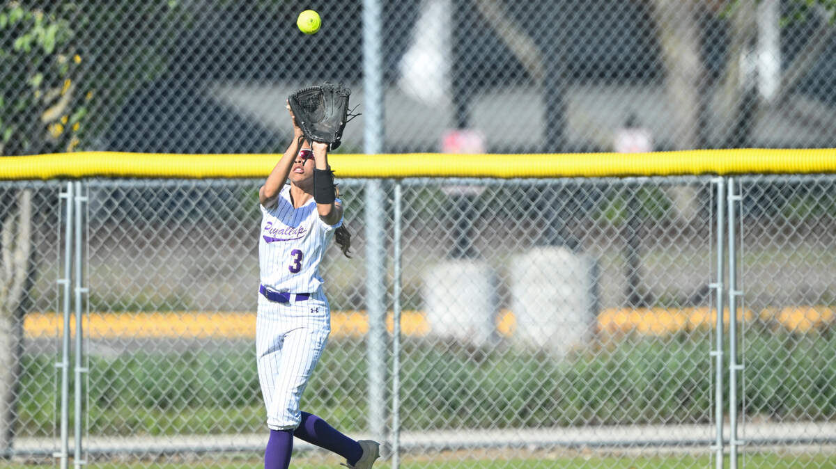 Puyallup’s Amori Hargrove (3) catches the ball in the outfield against Emerald Ridge during the softball game at Puyallup High School, on Friday, April 18, 2025, in Puyallup, Wash.