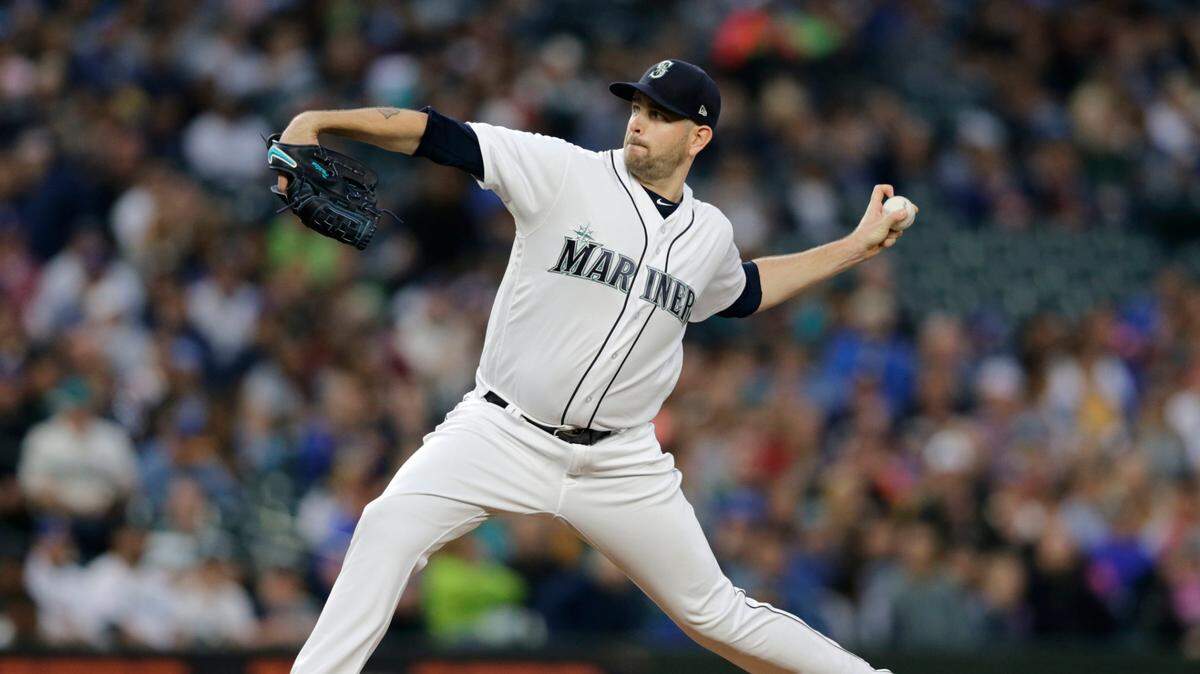 Seattle Mariners starting pitcher James Paxton works against the Texas Rangers during the first inning of a baseball game, Saturday, Sept. 29, 2018, in Seattle. (AP Photo/John Froschauer)