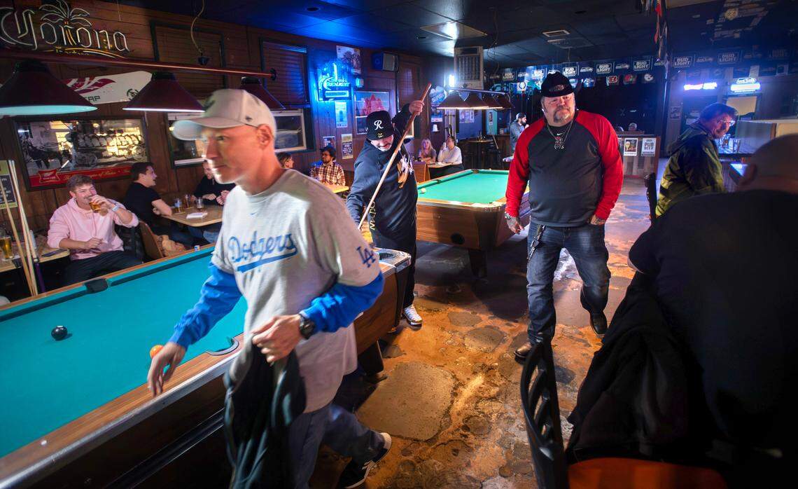 Patrons at the Unicorn Sports Bar & Grill in Ruston, Washington, Friday, Oct. 25, 2024.