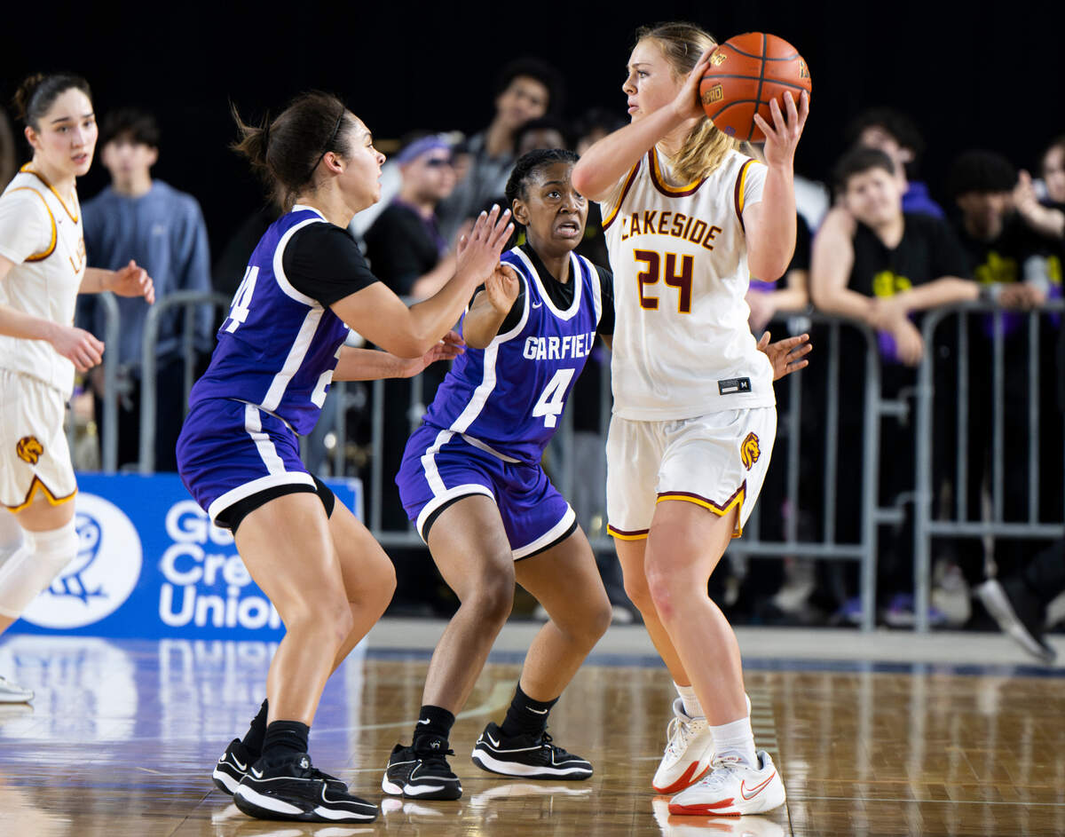 Lakeside’s Mia Broom (24) looks to pass during the semifinals game of the Class 3A state tournament at the Tacoma Dome, on Friday, March 1, 2024, in Tacoma, Wash.