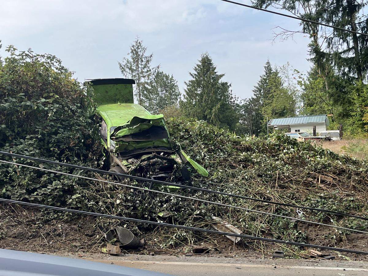 A lime green Dodger Hellcat crashed off of Orting Kapowsin Highway East on Friday, Sept. 5, near Orting, Wash.