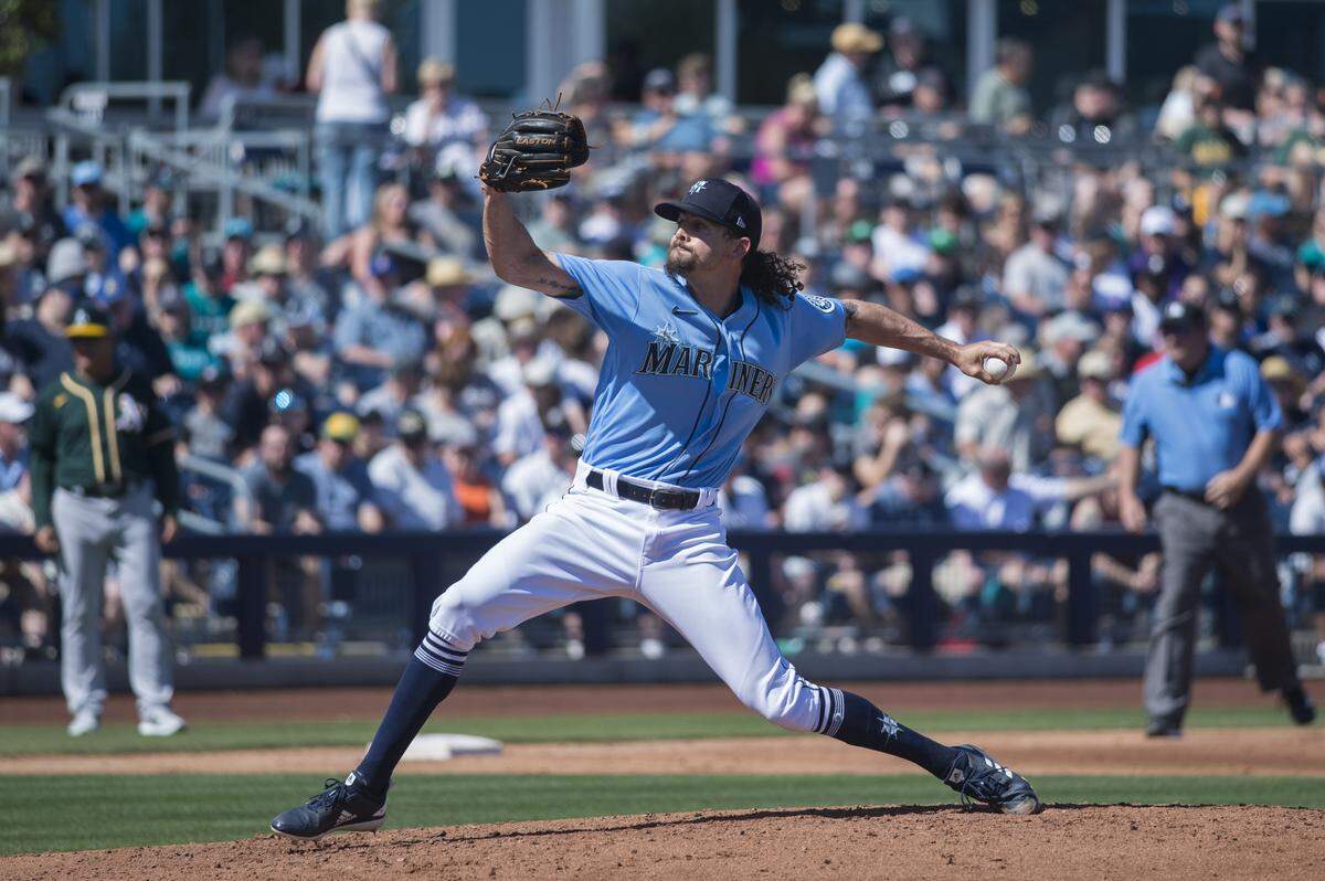 Seattle Mariners reliever Taylor Guilbeau pitches in a spring training game against the A’s on Saturday, March 7, 2020 at Peoria Stadium in Peoria, Ariz.