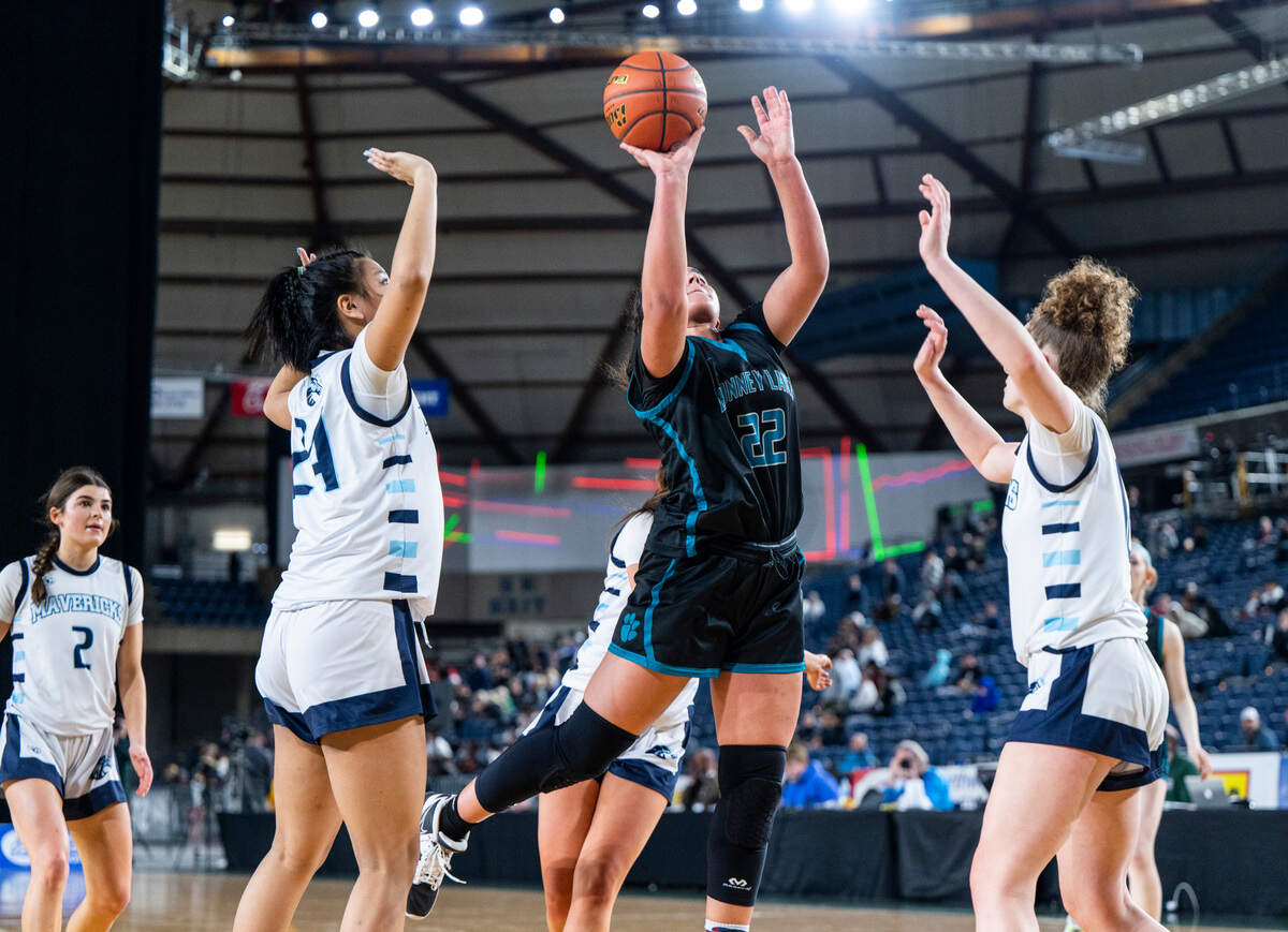Bonney Lake center Jazmyn Shipp (22) shoots a layup during an opening round game against Meadowdale at the WIAA state basketball tournament in the Tacoma Dome in Tacoma, Washington, on Wednesday, March 1, 2023. Shipp scored her 1,000th career point during the game. Bonney Lake lost the game 35-62.