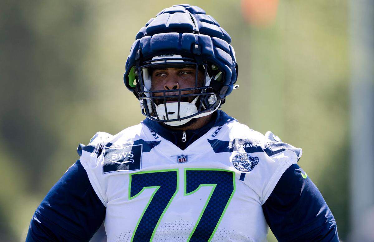 Seattle Seahawks defensive tackle Matt Gotel (77) , a Tacoma native from Lakes High School, runs drills during the first day of training camp at the Virginia Mason Athletic Center in Renton on Wednesday, July 24, 2024.