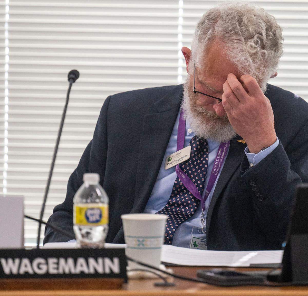 Clover Park School Board member Paul Wagemann scratches his head prior to the start of a meeting on Monday, June 13, 2022, in Lakewood, Wash.