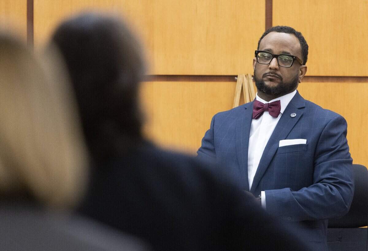 Dr. Roger Mitchell Jr., a forensic pathologist, waits as the jury enters the courtroom in Pierce County Superior Court, Wednesday, Oct. 12, 2023.