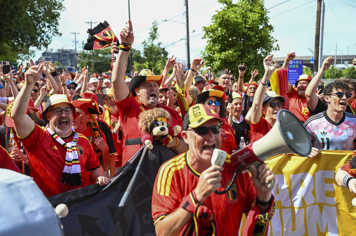 Fans of the “Red Devils,” take part in a fan march to the stadium ahead of Belgium’s opening World Cup match against Egypt on Monday, June 15, 2026, at Lumen Field, renamed “Seattle Stadium,” in Seattle, Wash.