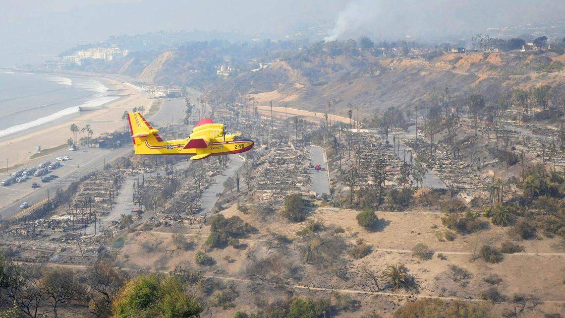 January 9, 2025: Airplanes assist in firefighting above Pacific Palisades. The Palisades Fire ignited earlier and devastated the coastal community in Los Angeles County.