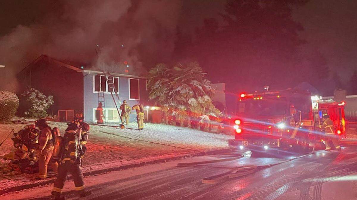 Tacoma firefighters put out the flames of a fire at a suspected cannabis-grow house on Feb. 14, 2025.
