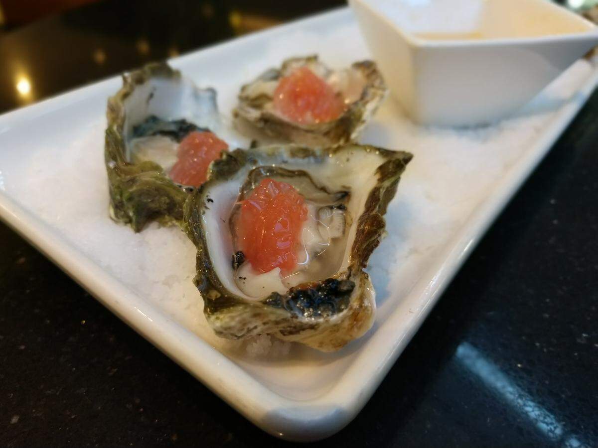 Oysters with slices of grapefruit, from Bar 960 at Hotel Murano in downtown Tacoma.