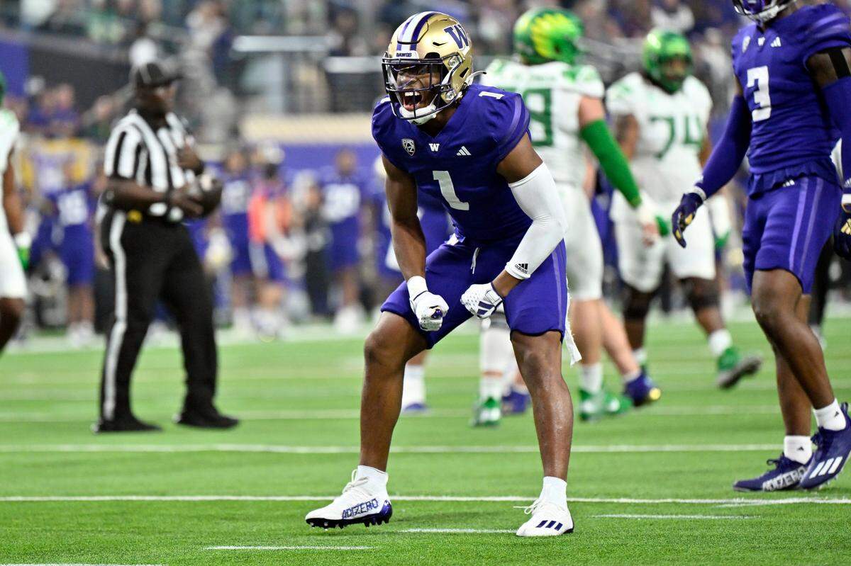 Washington cornerback Jabbar Muhammad (1) reacts after breaking up a pass against Oregon during the first half of the Pac-12 championship NCAA college football game Friday, Dec. 1, 2023, in Las Vegas. (AP Photo/David Becker)