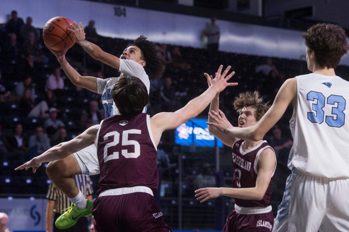 Rogers High School forward Ryan Avary puts up a shot during the third quarter of a basketball game against Mercer Island at the 2023 King Showcase on Monday, Jan. 16, 2023 at the ShoWare Center in Kent, Wash.