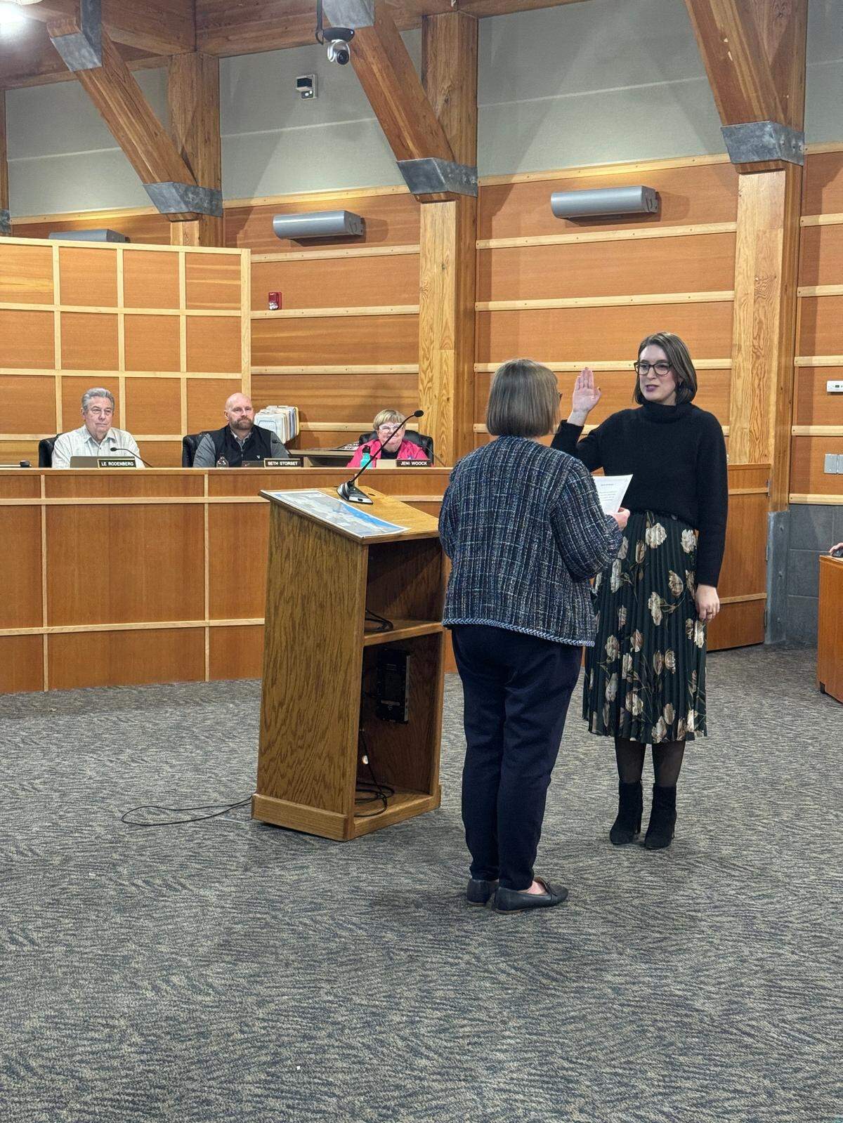 Gig Harbor Mayor Mary Barber delivers the oath of office to the City Council’s newest member, 31-year-old Emily (Em) Stone, Monday, Jan. 27, 2025.