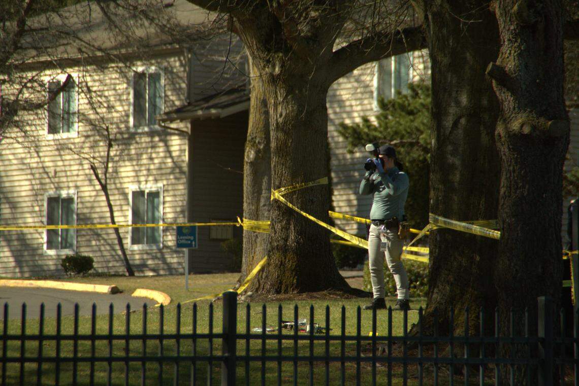 Tacoma Police Department personnel investigate the scene of a shooting at an apartment complex near Tacoma Community College on Wednesday, March 29, 2023 in the 1400 block of South Mildred Street. Police said a boy, 16, was killed.